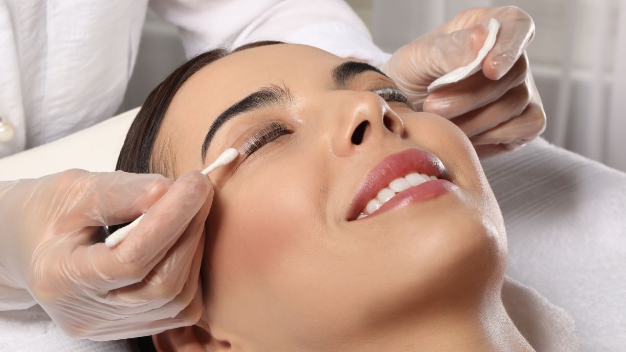 Young woman undergoing eyelash